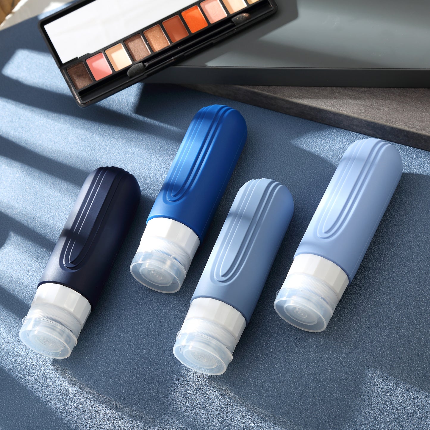 Micebay Leak-Proof 3-oz Silicone Squeezable Travel Bottles for Toiletries, Refillable Travel Size Containers, BPA Free, TSA Approved, Blue, 4 Pack