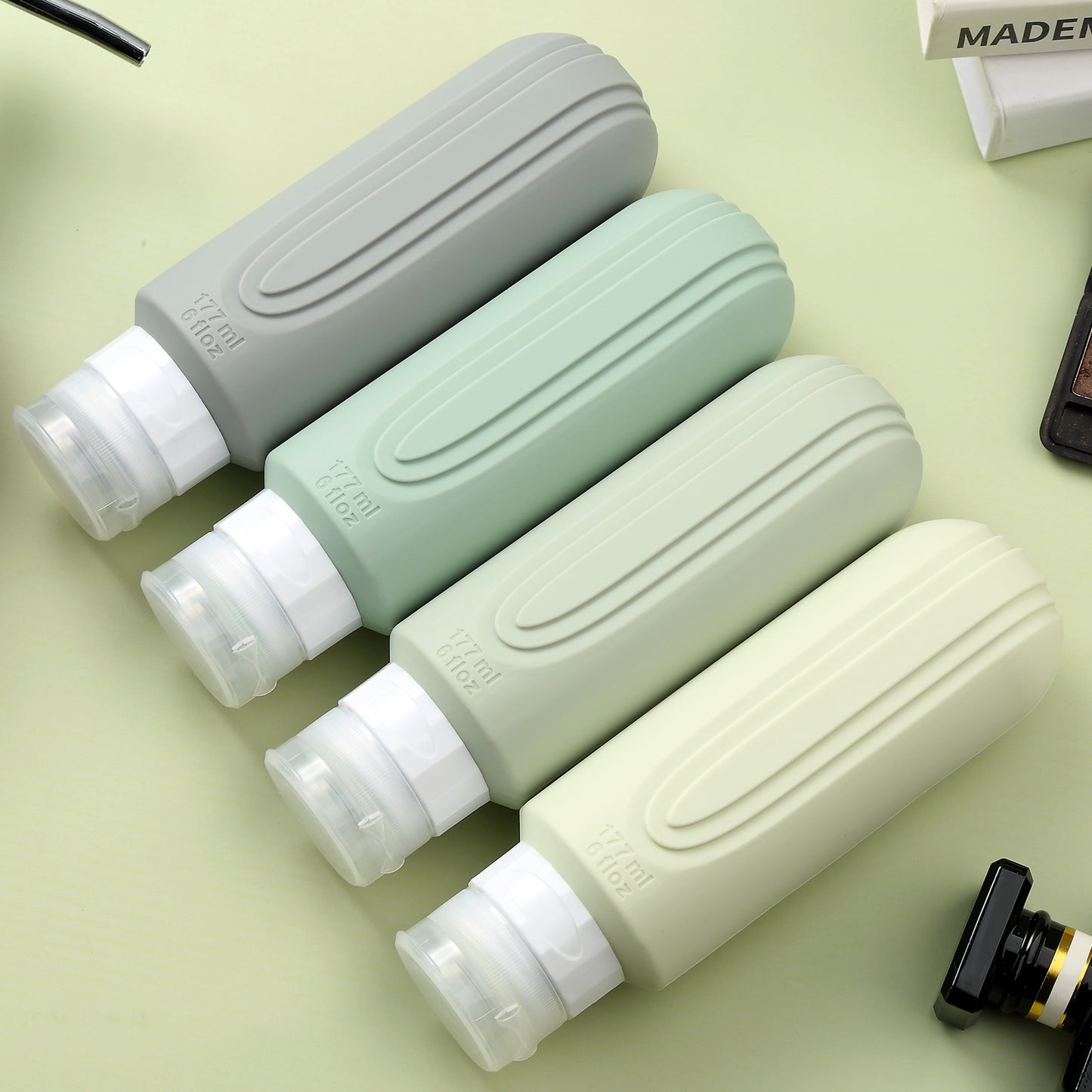 Micebay Leak-Proof 6-oz Silicone Squeezable Travel Bottles for Toiletries, Refillable Travel Size Containers, BPA Free, TSA Approved, Mint-Gray, 4 Pack
