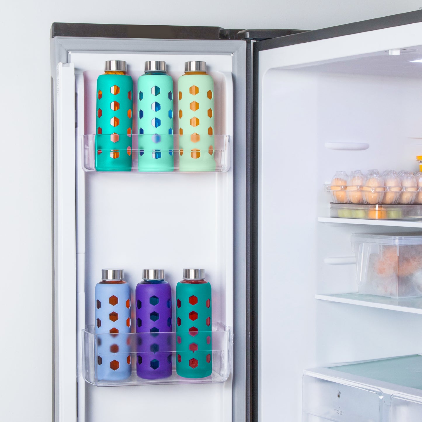 Micebay Glass Juice Bottles with Lids and Silicone Sleeves 18 oz, 4-Pack Reusable Clear Glass Water Bottles with Stainless Steel Airtight Cap for Juicing, Refrigerator, BPA Free Leak-Proof Drinking Jar