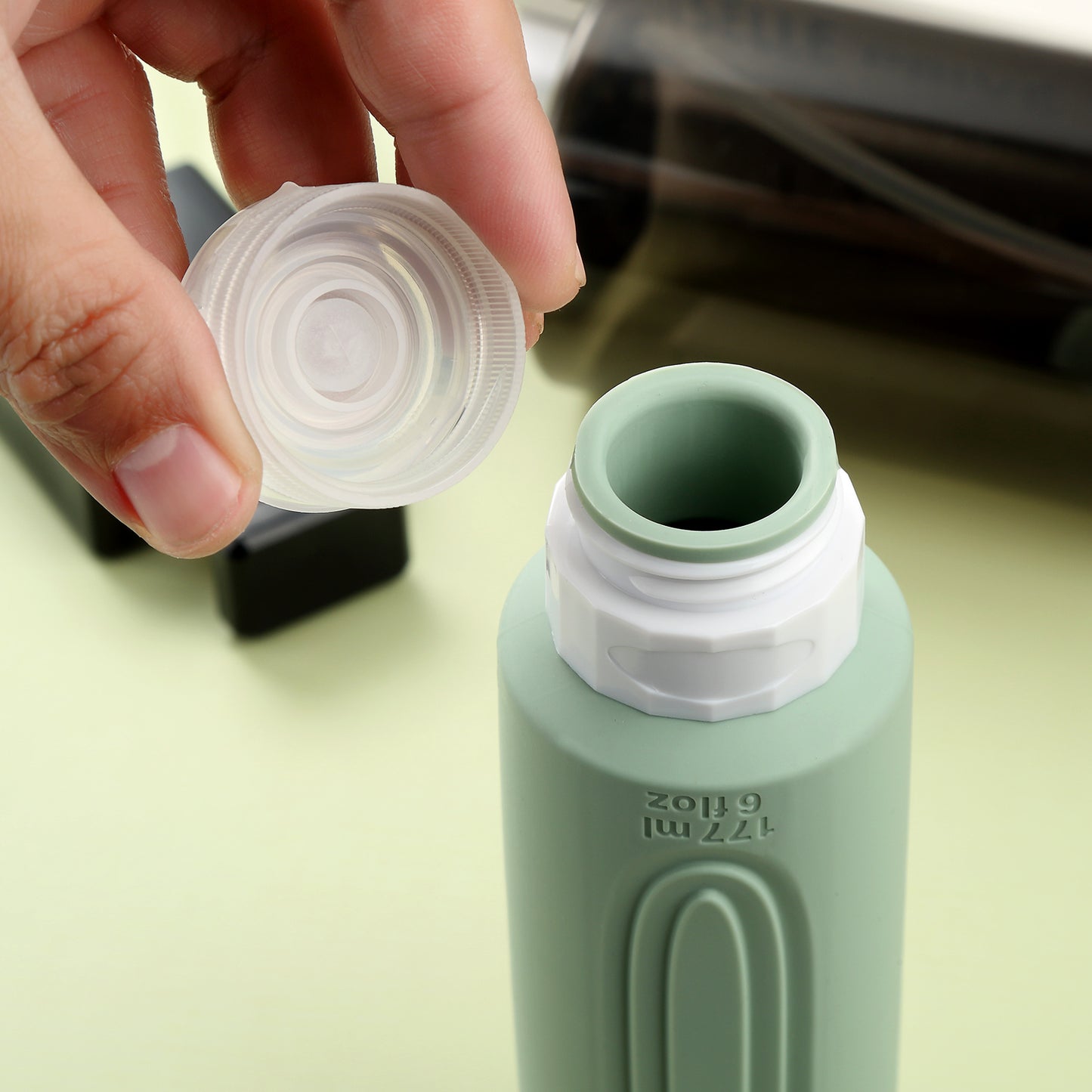 Micebay Leak-Proof 6-oz Silicone Squeezable Travel Bottles for Toiletries, Refillable Travel Size Containers, BPA Free, TSA Approved, Mint-Gray, 4 Pack